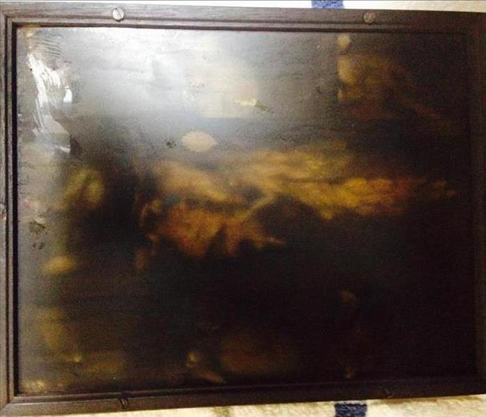 Painting covered in soot