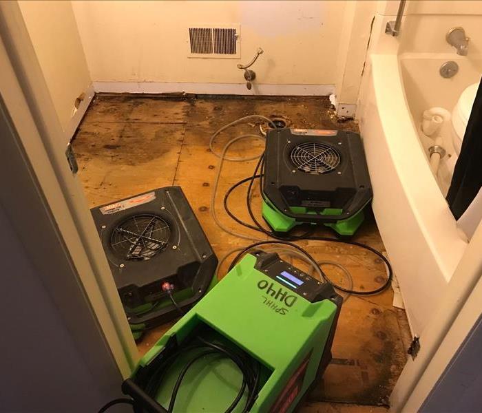 Exposed sub-floor due to water loss