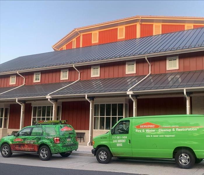 SERVPRO green vehicles parked in front of the Gettysburg Visitors center