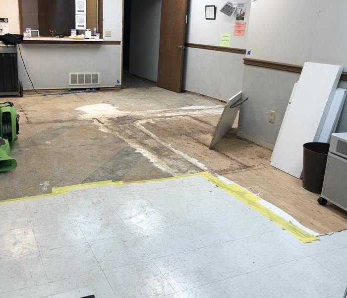 Exposed subfloor after a commercial water loss